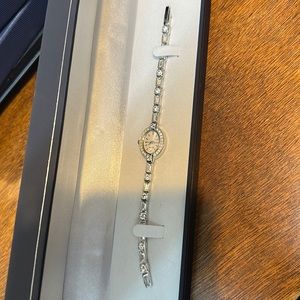 Bulova ladies Swarovski Crystal watch with tennis bracelet 96t49